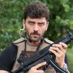 Arquivo:Tolga Erlik.jpg