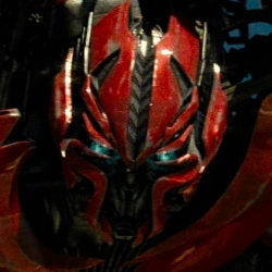 Arquivo:Dino-TransformersDOTM.png