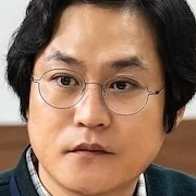 Arquivo:Kim Sung-Kyun - O Agente Faixa - Preta.jpg