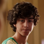 Sam Brenner (13 anos) em Pixels