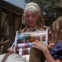 Vendedora de Fitas em João e Maria (1987) (Herbert Richers)
