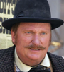 A.W. Merrick em Deadwood: Cidade sem Lei