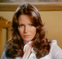 Kelly Garrett (2ª voz) em As Panteras (Telecine)