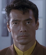 Comandante Akio Ishimuro em Ultraman Tiga, Ultraman Dyna e Ultraman Gaia - A Batalha no Hiperespaço